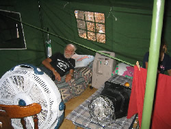 EnergyWhiz Olympics partiPhoto of man in tent with quiet electricity.